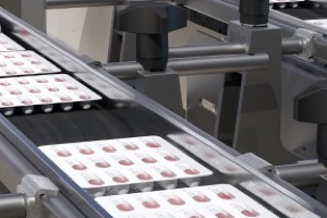 Blister packs moving along a commercial production line